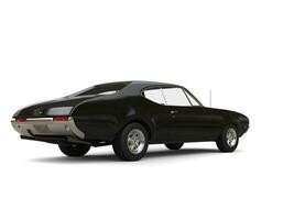Black vintage restored muscle car - rear view photo