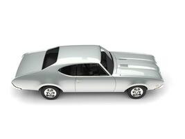 Silver metallic vintage restored muscle car - top down view photo