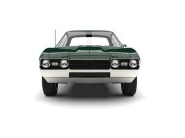 Deep jungle green vintage restored muscle car - front view photo