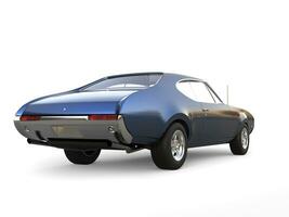 Dark metallic blue old school vintage muscle car - back view photo