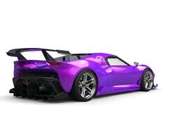 Modern supercar with two tone pink and purple pearlescent paint - rear view photo