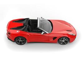 Modern red cabriolet sports car - top down view photo