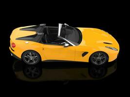 Modern sun yellow cabriolet sports car - top down view photo