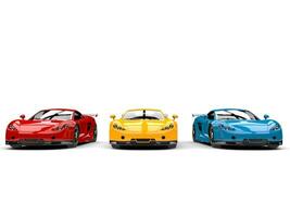 Modern super sports cars in primary colors - red, yellow and blue - front view photo