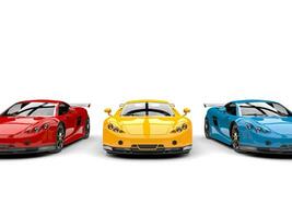 Modern super sports cars in primary colors - red, yellow and blue - front view photo