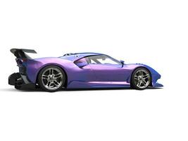 Modern super sports car in two tone metallic purple color photo