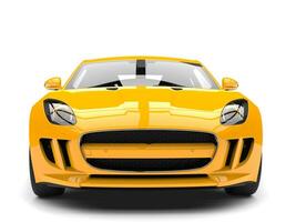 Modern warm yellow luxury sports car - front view closeup shot photo