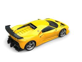 Modern yellow super sports race car - back view photo
