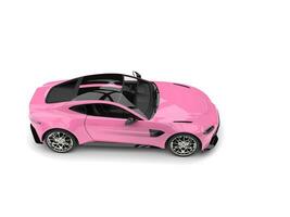 Candy pink modern luxury sports car - top down view photo