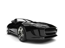 Modern black fast luxury sports car - front view extreme closeup shot photo