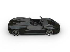 Shiny black modern convertible luxury super car - top down view photo