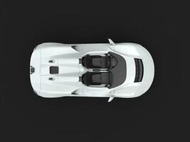 Luxury sports supercar in white color - top down view photo