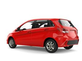 Bright red modern compact car - side view photo