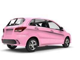 Modern small compact cars in fabulous pink color - back view photo