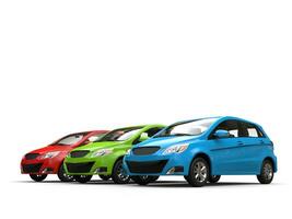 Modern small compact economic cars in red, green and blue photo