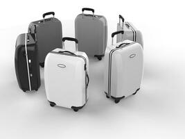 Monochrome suitcases - isolated on white background photo