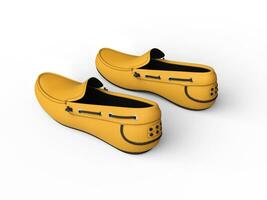 Pair of yellow loafers with black stitching - top back view - isolated on white background photo
