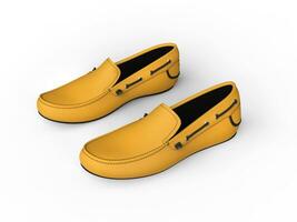 Pair of yellow loafers with black stitching - top view - isolated on white background photo