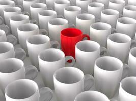 Red coffee mug in crowd of white mugs photo