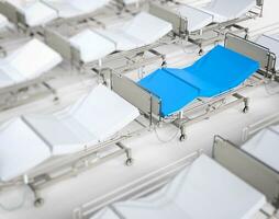 White hospital beds - blue stands out photo