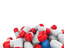montón de rojo y azul medicina pastillas foto