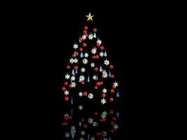 Christmas tree decorations - isolated on black photo