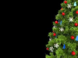 Closeup of christmas tree - isolated on black photo