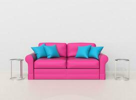 Pink sofa with light blue pillows with two end tables on the sides photo