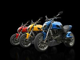 Sports motorcycles in a row - primary colors - isolated on black reflective background photo