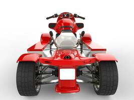 Modern red quad bike - back view closeup shot photo