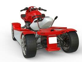 Red and white quad bike - back view photo