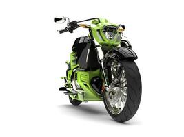 Crazy green modern powerful chopper bike - front wheel closeup shot photo