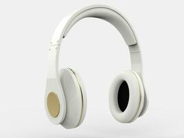 Modern wireless shiny white heaphones with gold details photo