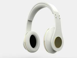 Wireless modern white headphones with gold details photo