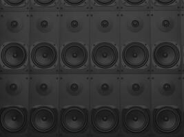 Wall of matte black bass music speakers photo