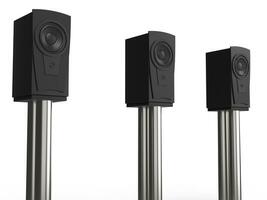 Three modern music speakers on chrome stands - closeup shot photo