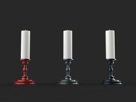 Three white wax candles on shiny metallic red, grey and black candleholders photo