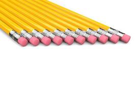 Eraser ends of yellow graphite pencils in a row photo