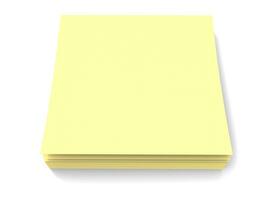 Small block of pale yellow sticky notes photo