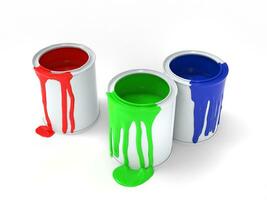 Red, green and blue paint dripping from the sides of paint cans photo