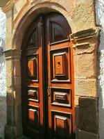 Old heavy wooden doors photo