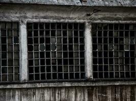 Destroyed factory windows - rust leaking photo