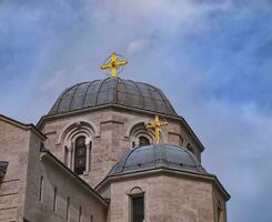 Orthodox church done with golden crosses photo