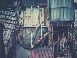 Urban decay - old decaying factory photo