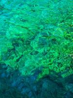 Crystal clear turquoise water photo