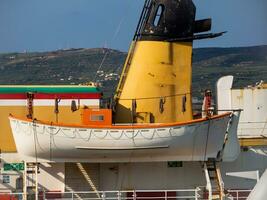 Lifeboat on a big transport ship photo