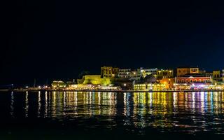 Old part of Chania port - Old town by the sea - Night scene - Crete, Greece photo