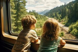 Children looking out of train windows in awe photo