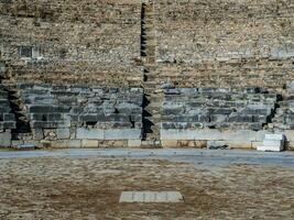 Stone steps of the ancient Greek amphitheatre photo