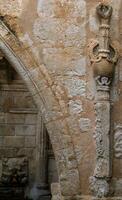 Detail on a ancient Roman wall in old town of Rethymno, Greece photo